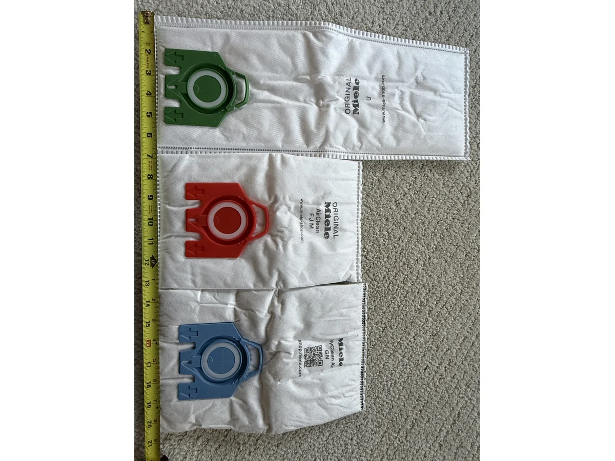 Miele GN FJM and Type U vacuum bags measured side by side by length